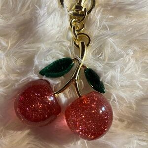 Glittering Cherry Keychain with Gold Accents